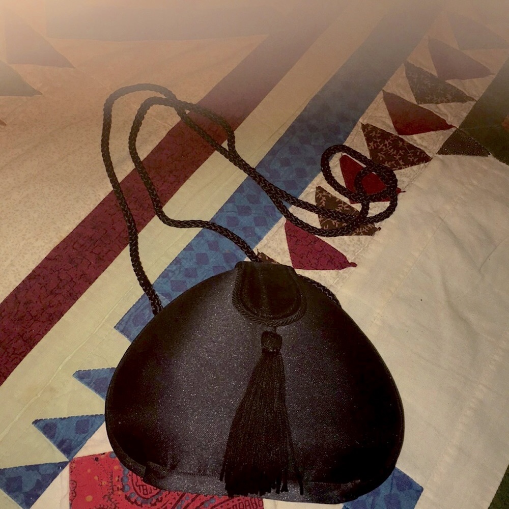 NWOT Heart Shape Black Clutch Snap with Tassels
